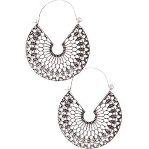 Silver bohemian earrings. Textured metal